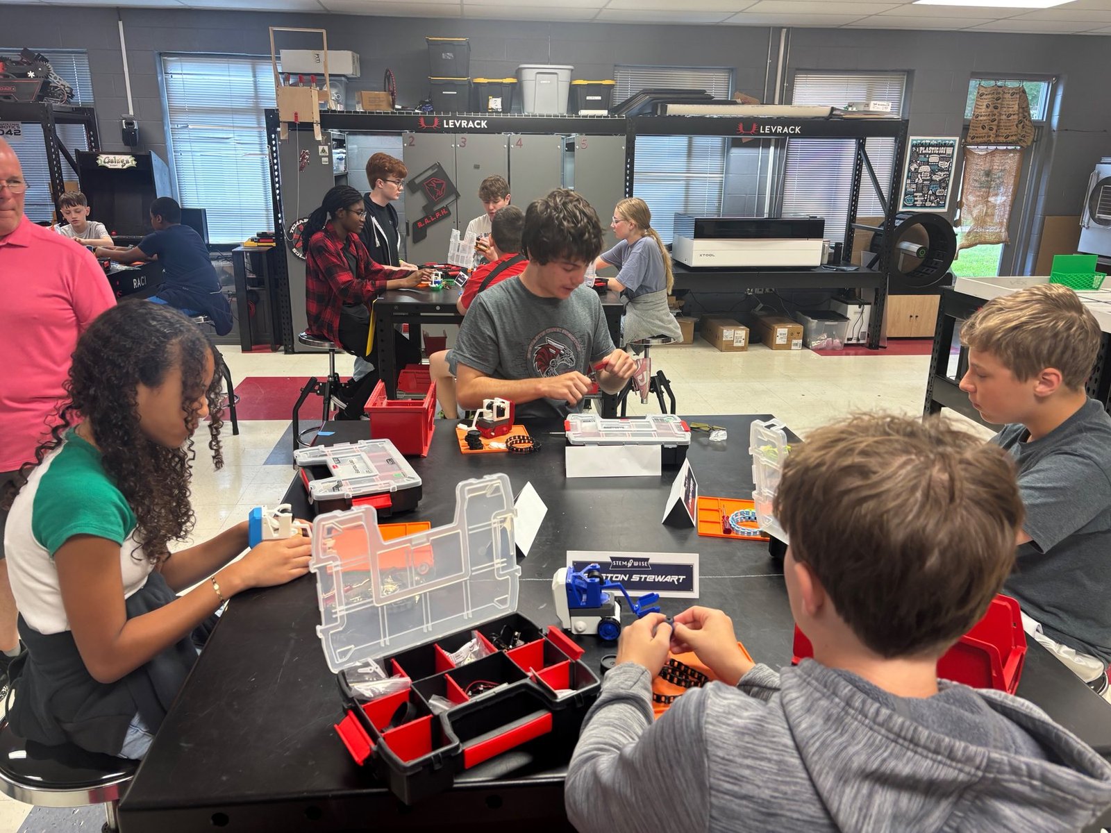 STEMWISE students building robot components together
