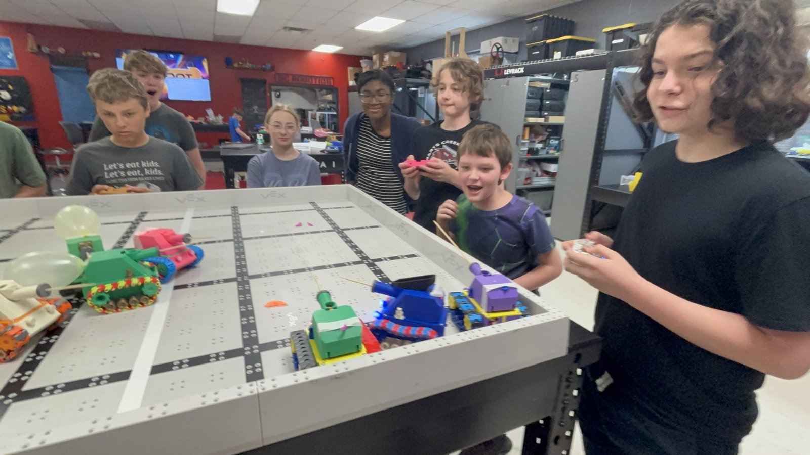 Campers reacting to a live robot test at STEMWISE camp